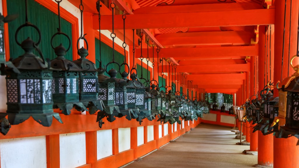 Kasuga Taisha Shrine with stone lanterns in Nara, a scenic day trip attraction from Kyoto Japan