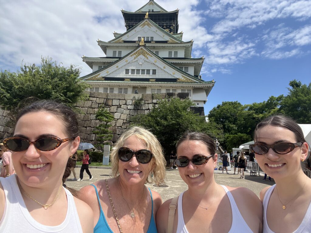 Osaka Castle surrounded by stone walls and moat in Osaka Japan on a 10-day Japan itinerary