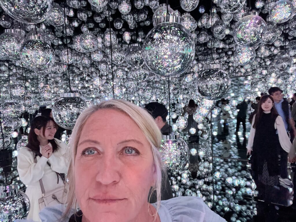 Glowing immersive digital art installation at teamLab Borderless Azabudai Hills Tokyo Japan